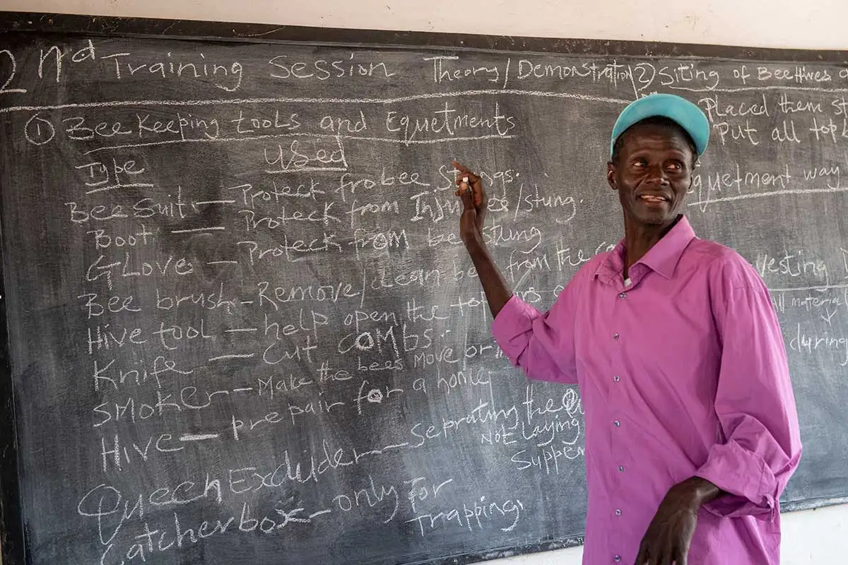 Beekeeper Keita Jawo trains the women in beekeeping